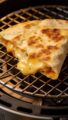 Travel Solo As A Women All Across The Globe!!! air fryer quesadilla on wire rack, melted cheese ooze