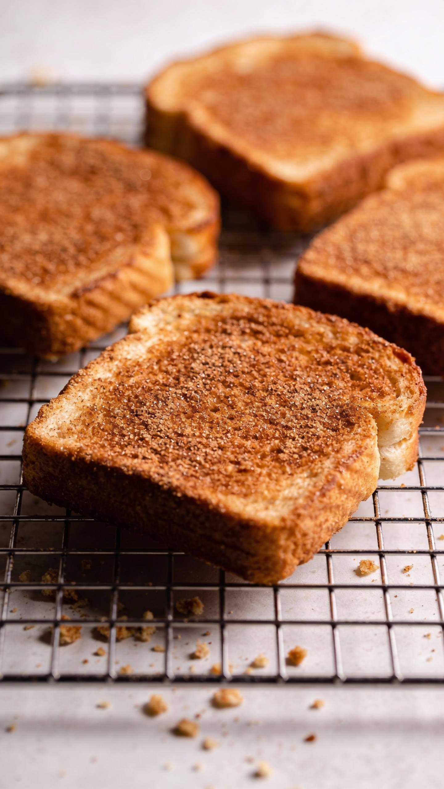 Air fryer cinnamon sugar toast on cooling rack