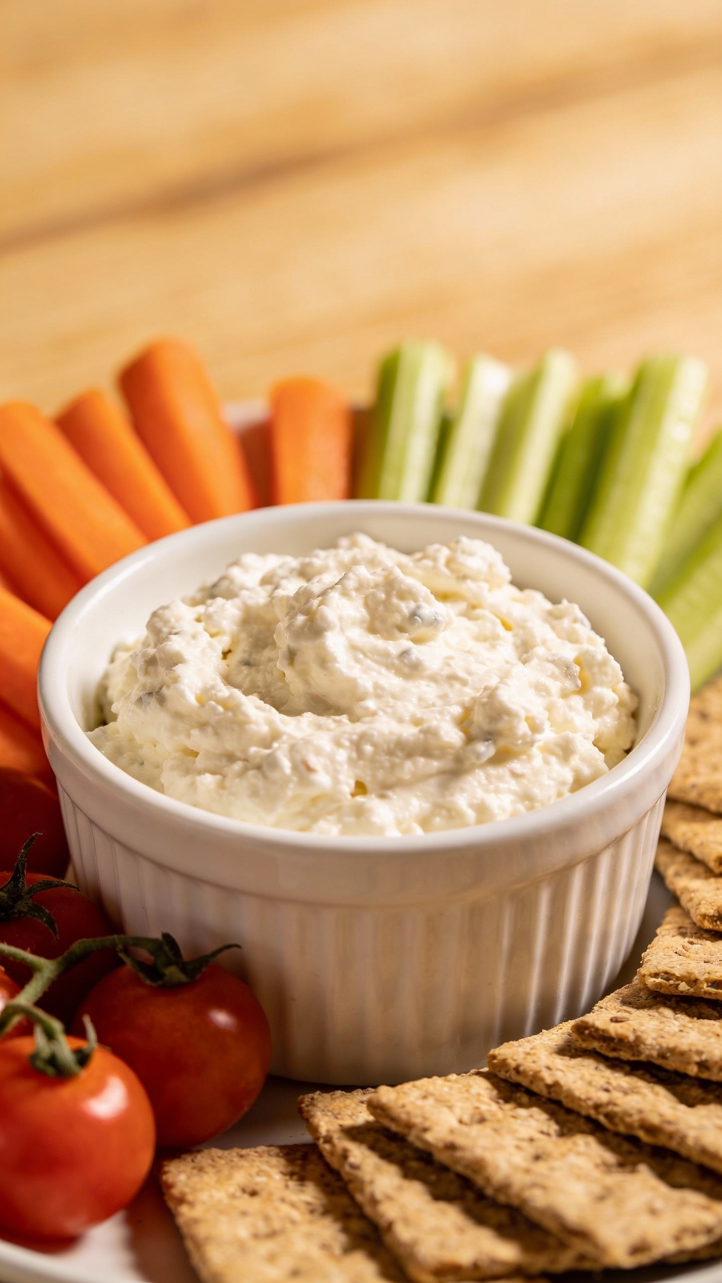 Cottage cheese dip with veggies and whole-grain crackers