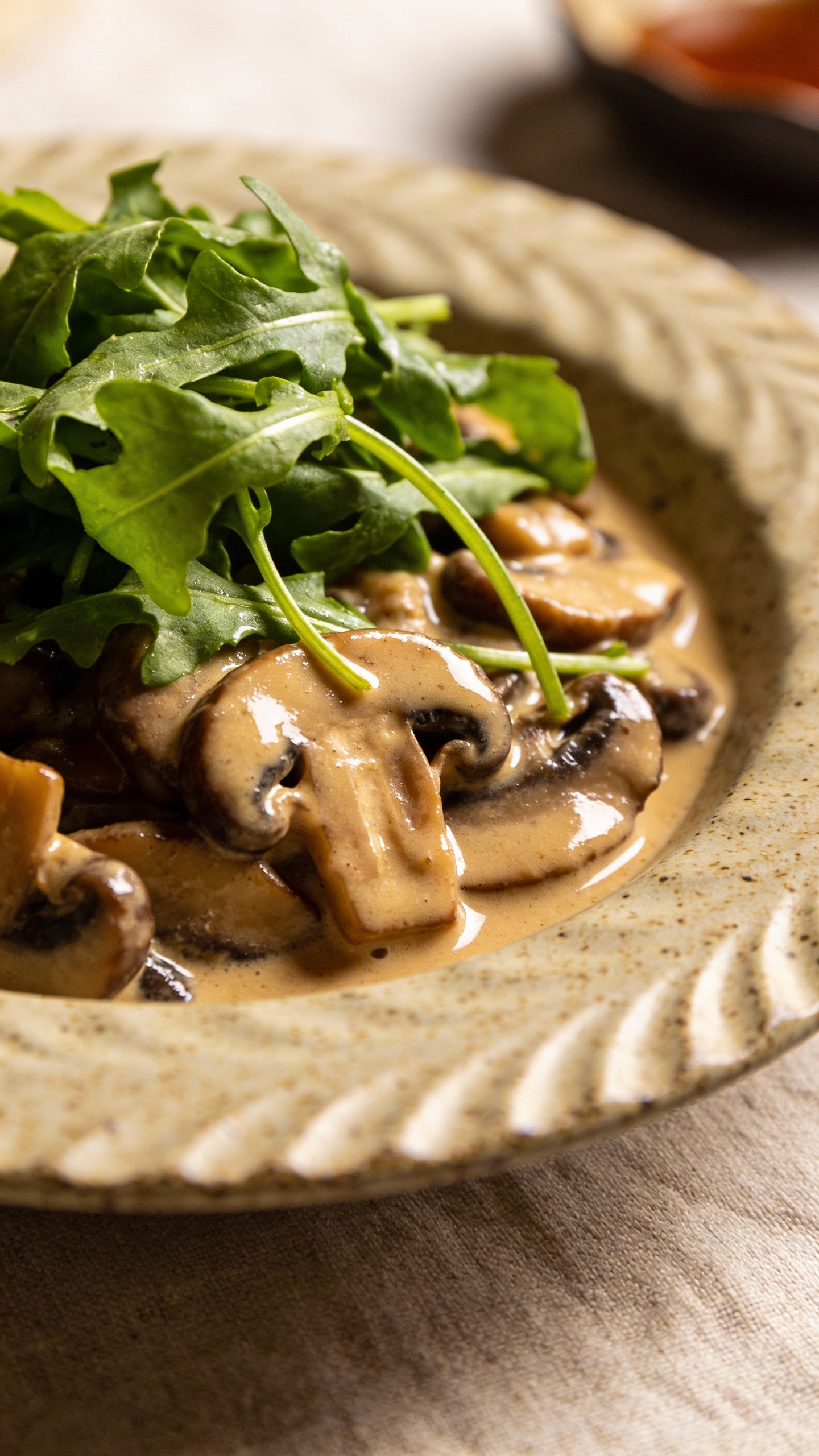 miso mushroom bowl with greens on ceramic plate