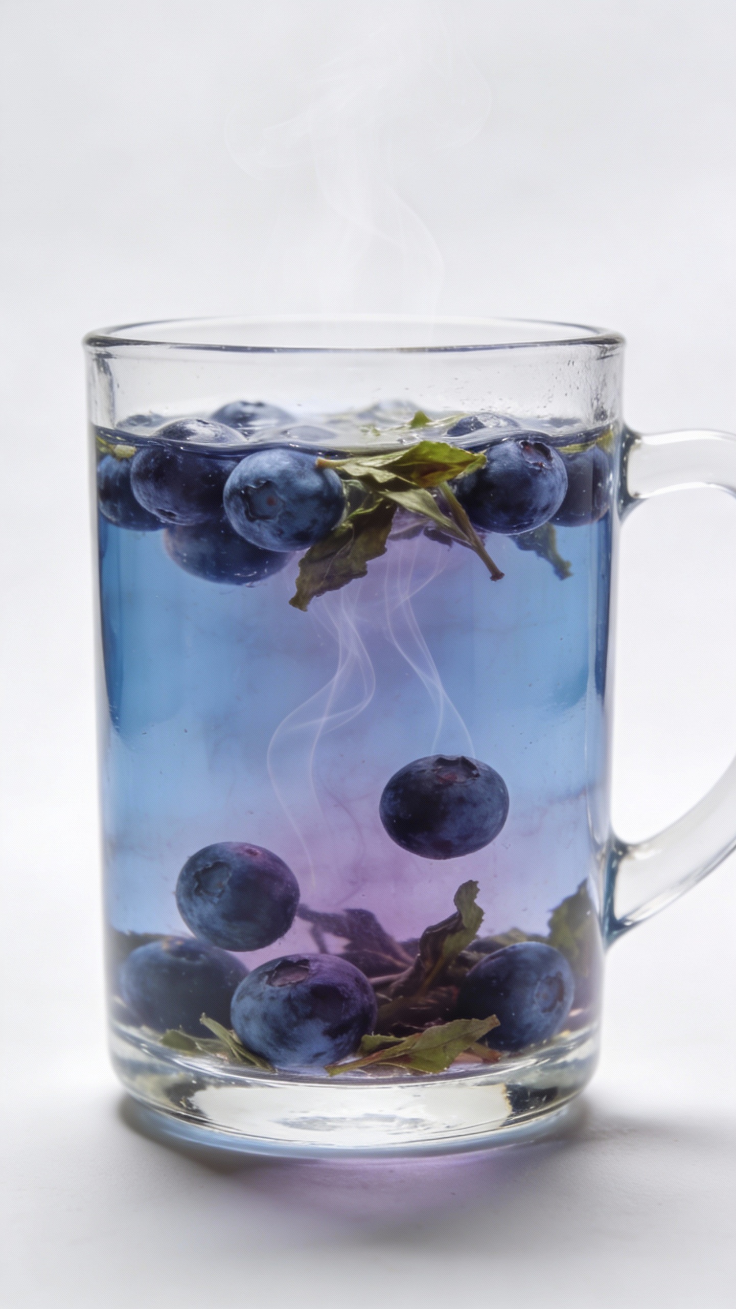 blueberry herbal tea in clear glass mug, steam, white backdrop